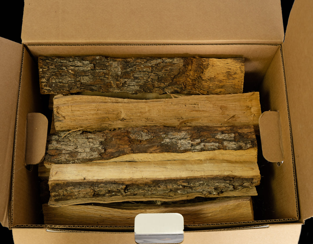 Stacked post oak cooking wood logs, perfect for grilling, barbecuing, and smoking meats.