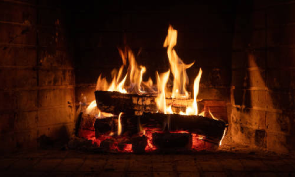 a close up of a fire burning in a fireplace