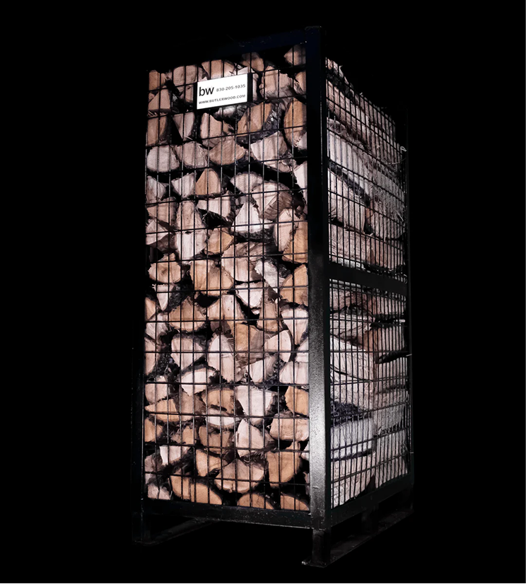 Stacked cherry cooking wood logs, a ButlerWood product.