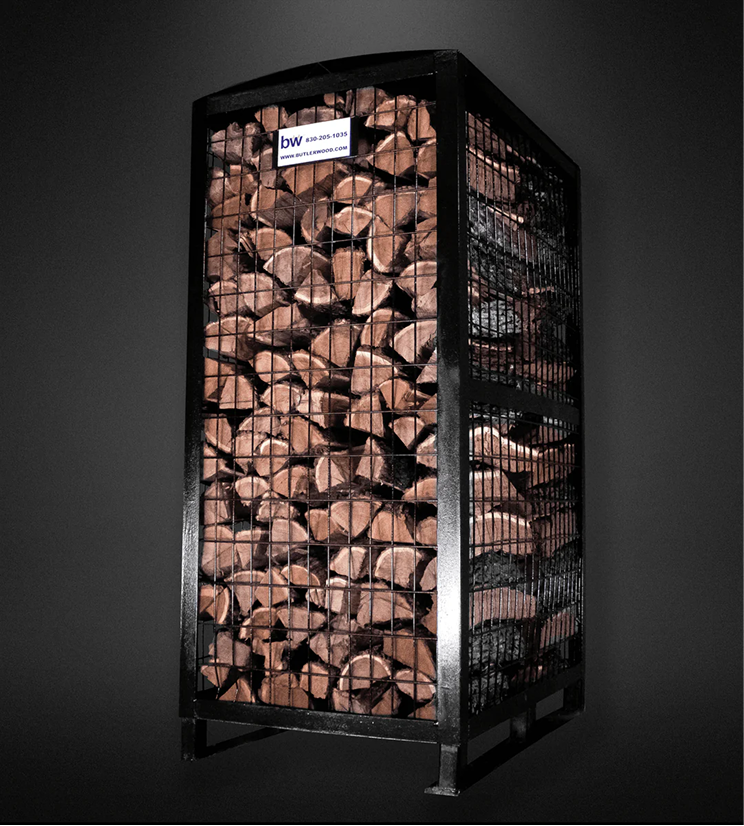 Stacked mesquite cooking wood logs, a ButlerWood product.