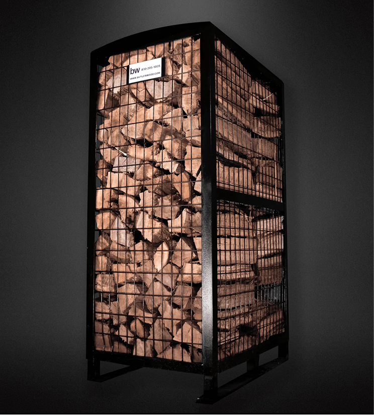 Stacked pecan cooking wood logs, a ButlerWood product.