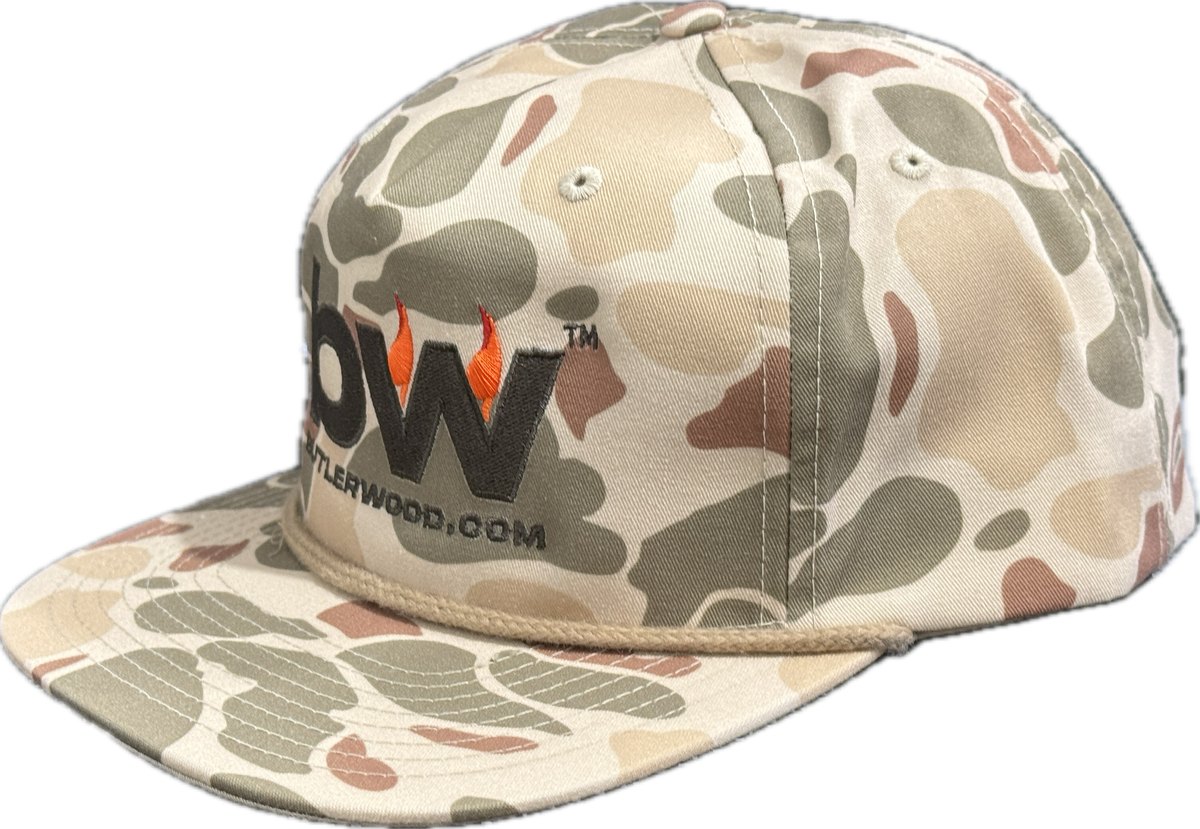 Camouflage-patterned cap with Butlerwood logo on a transparent background.