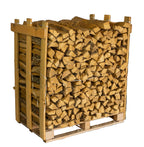 Stack of large post oak cooking wood logs on a clean surface, ready for barbecuing and smoking.