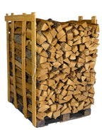 Post oak cooking wood logs stacked neatly on a wooden surface, ready for grilling or smoking.