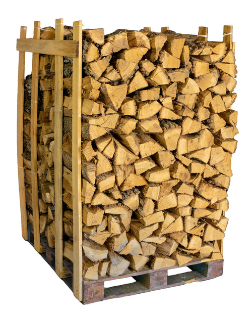 Close-up of post oak cooking wood logs neatly stacked, showcasing the texture and quality of the wood.